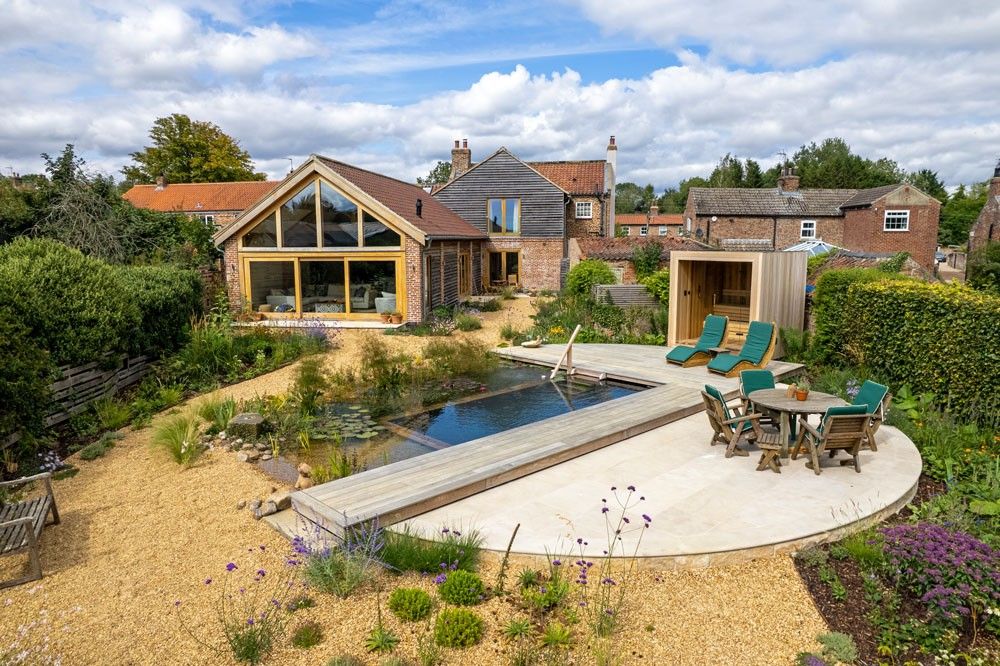 Der Biotop Design Award 2025 mit Bild Platz 3 in der Kategorie "ausgezeichnete Swimming Ponds"